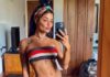 Aline Riscado surge de biquíni e exibe boa forma