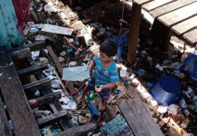 Como vivem os moradores de uma das maiores favelas de palafitas do Brasil