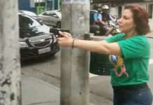 Carla Zambelli saca arma na rua em SP e pode responder por ameaça e constrangimento ilegal