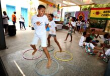 Neojiba e Projeto Axé promovem transformação social na vida de crianças e adolescentes baianos Logo