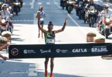 Núbia Oliveira, atleta baiana apoiada pelo Governo do Estado, conquista terceiro lugar na São Silvestre 2024 Logo
