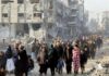 Palestinos começam a retornar para uma Gaza devastada Palestinos começam a retornar para uma Gaza devastada